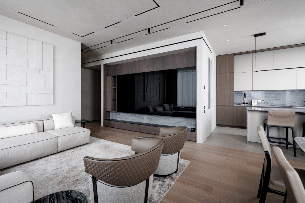 Источник вдохновения для домашнего уюта: большая открытая гостиная комната в современном стиле с музыкальной комнатой, серыми стенами, паркетным полом среднего тона и скрытым телевизором