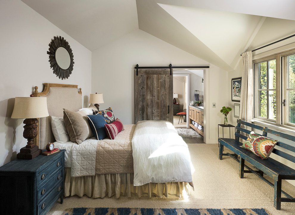 Inspiration for a rustic carpeted bedroom remodel with white walls