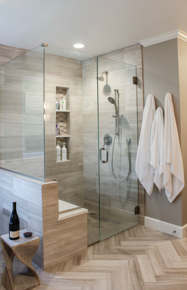 Large transitional master limestone tile limestone floor and beige floor freestanding bathtub photo in Denver with brown cabinets, quartz countertops, a hinged shower door, shaker cabinets, gray walls and an undermount sink