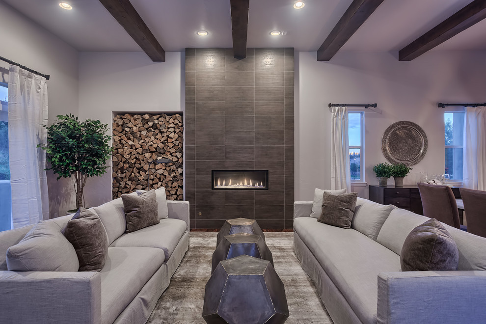 Transitional living room in Denver with white walls, a ribbon fireplace and a tile fireplace surround.