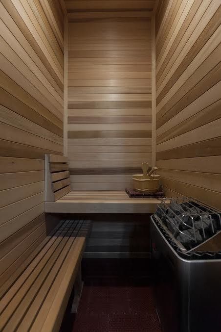 Example of a large transitional medium tone wood floor bathroom design with shaker cabinets and white cabinets