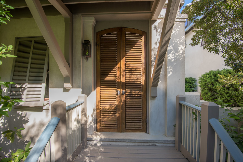 This is an example of a beach style entryway in Miami.