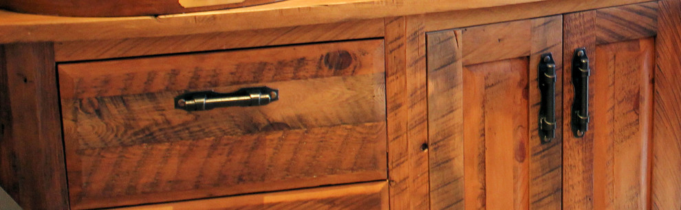 Inspiration for a large rustic built-in desk medium tone wood floor home design remodel with brown walls and no fireplace
