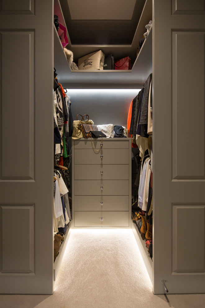 This is an example of a traditional storage and wardrobe in London.