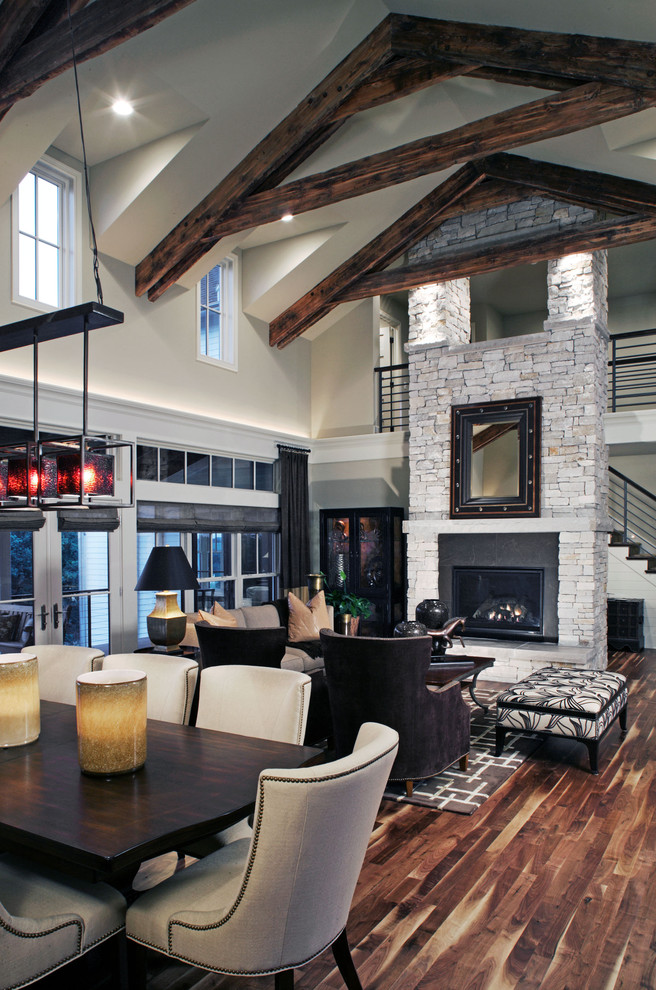 This is an example of a country living room in Omaha with white walls, a standard fireplace and no tv.