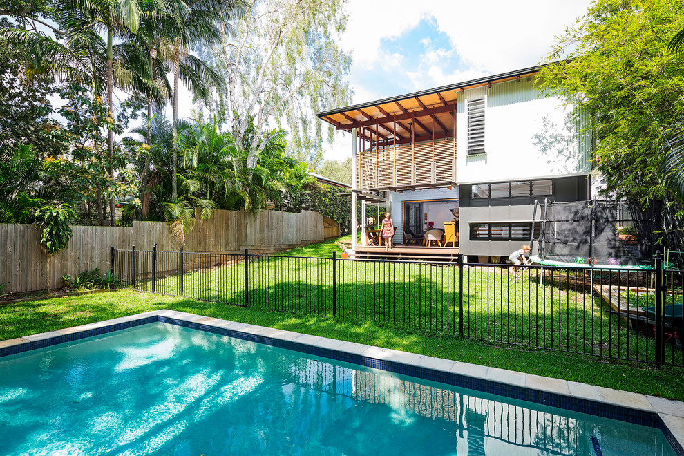Inspiration for a contemporary backyard pool in Brisbane.