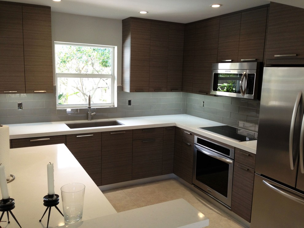 Example of a transitional kitchen design in Miami