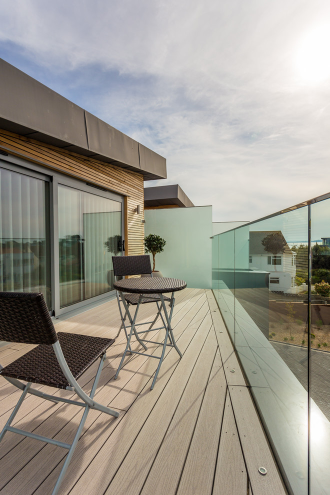 Mid-sized modern balcony in Dorset with no cover.