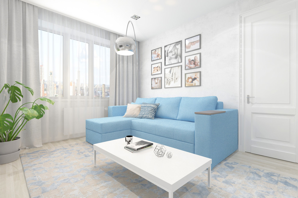 Гостиная комната с голубым диваном