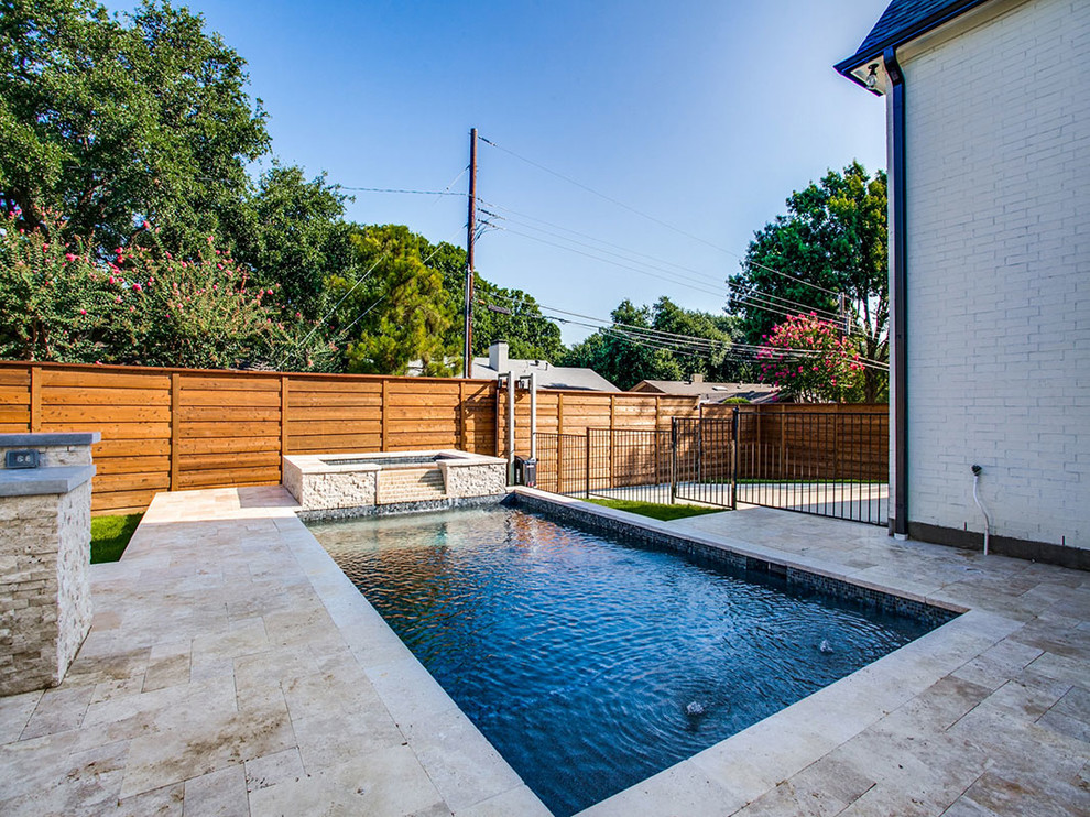 Transitional two-story pool photo in Dallas