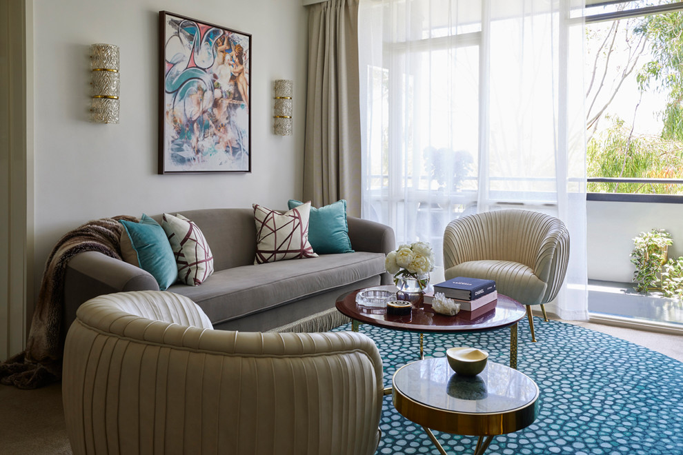 Design ideas for a mid-sized eclectic formal enclosed living room with white walls, carpet, a concealed tv and turquoise floor.