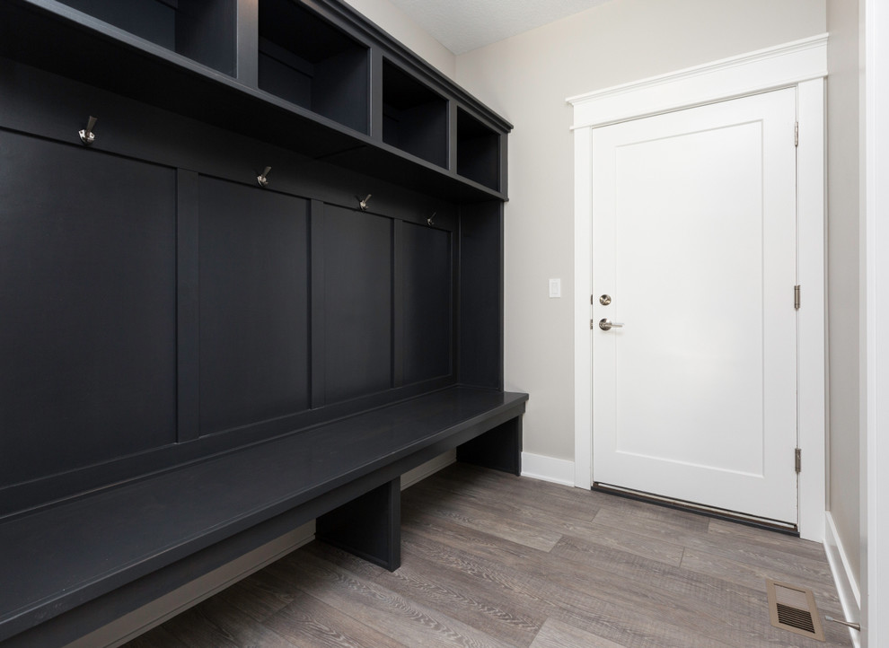 Modern mudroom in Other with a single front door and a white front door.