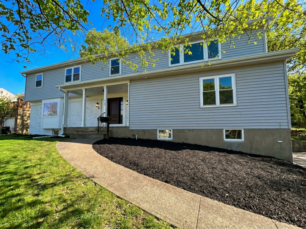 Front Facade with Walkway and White Brick Base