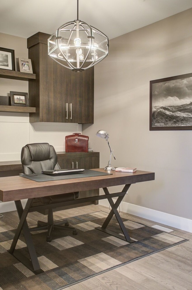 Photo of a contemporary home office in Calgary.