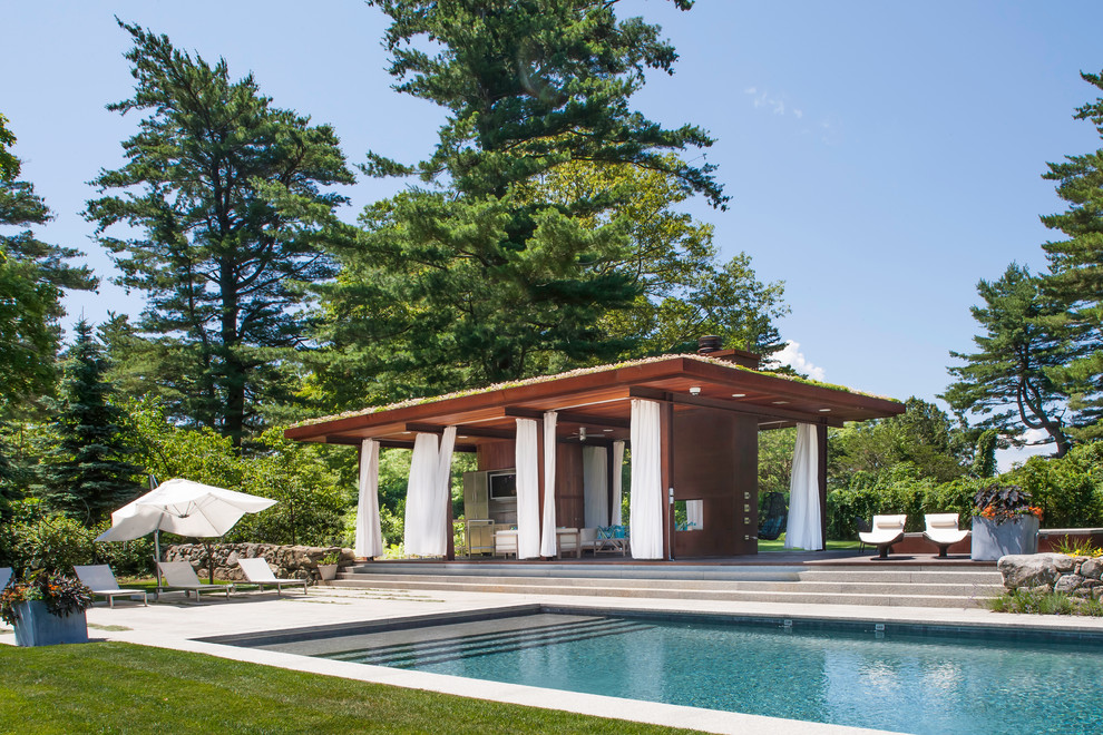 Inspiration for a contemporary rectangular pool in New York.