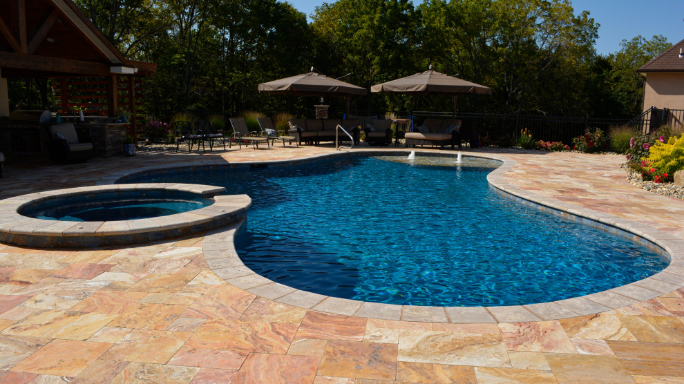 Design ideas for a contemporary swimming pool in Kansas City.