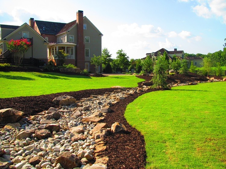 Design ideas for an expansive traditional backyard full sun garden for summer in Atlanta with mulch.