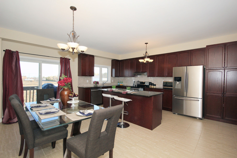 Transitional home design photo in Toronto