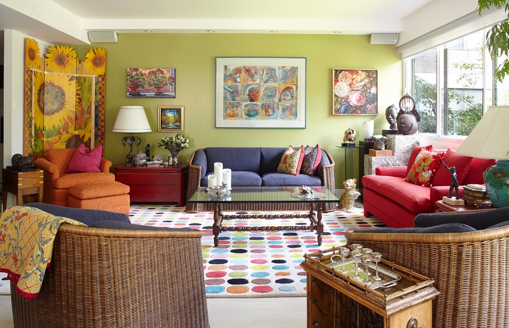 This is an example of an eclectic living room in Montreal with green walls and no tv.