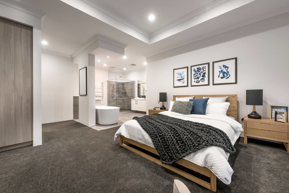 Large contemporary master bedroom in Perth with white walls, porcelain floors and brown floor.