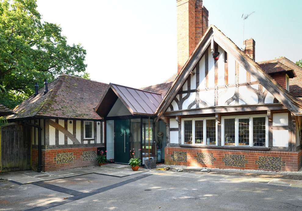 This is an example of a medium sized traditional bungalow detached house in Surrey.