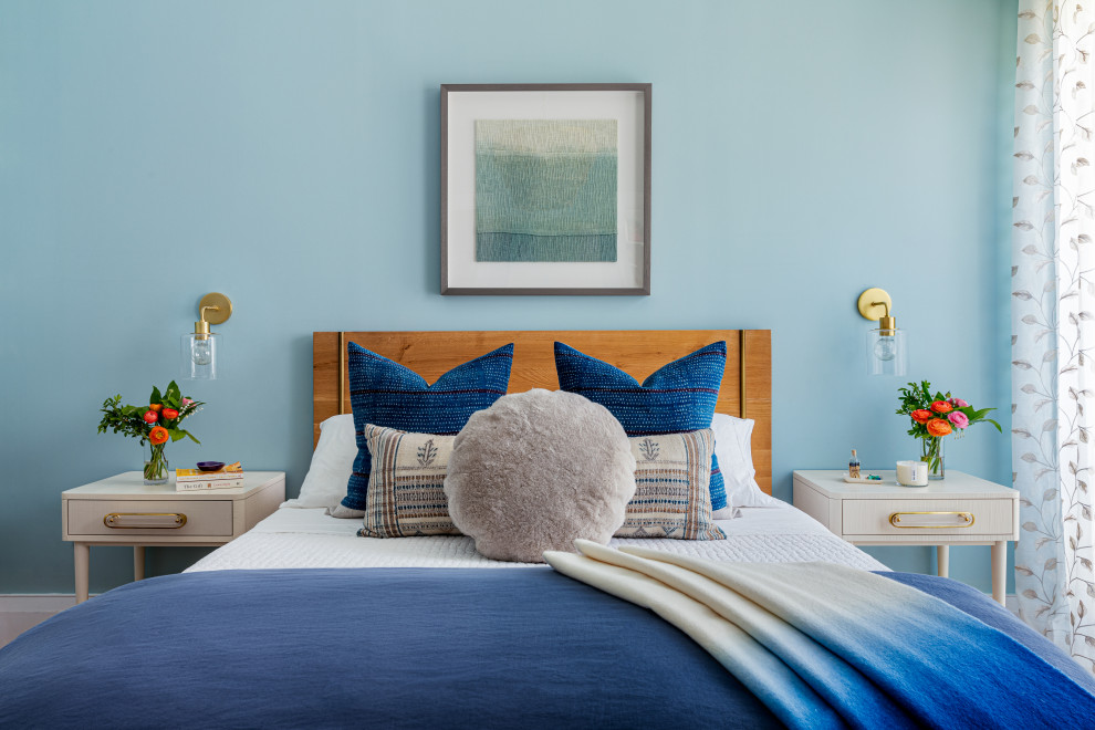 Inspiration for a contemporary master bedroom remodel in Austin with blue walls
