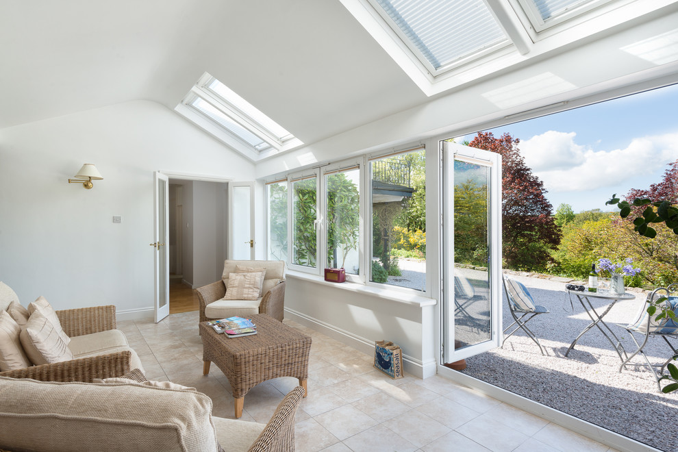 Design ideas for a mid-sized country sunroom in Devon with a skylight.