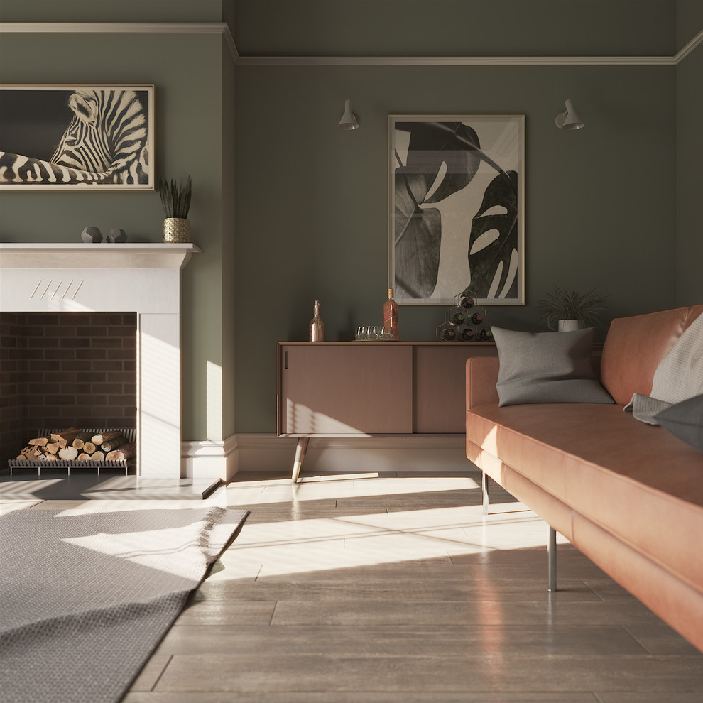 Inspiration for a medium sized retro enclosed living room with green walls, medium hardwood flooring, a standard fireplace, a plastered fireplace surround, a wall mounted tv and brown floors.