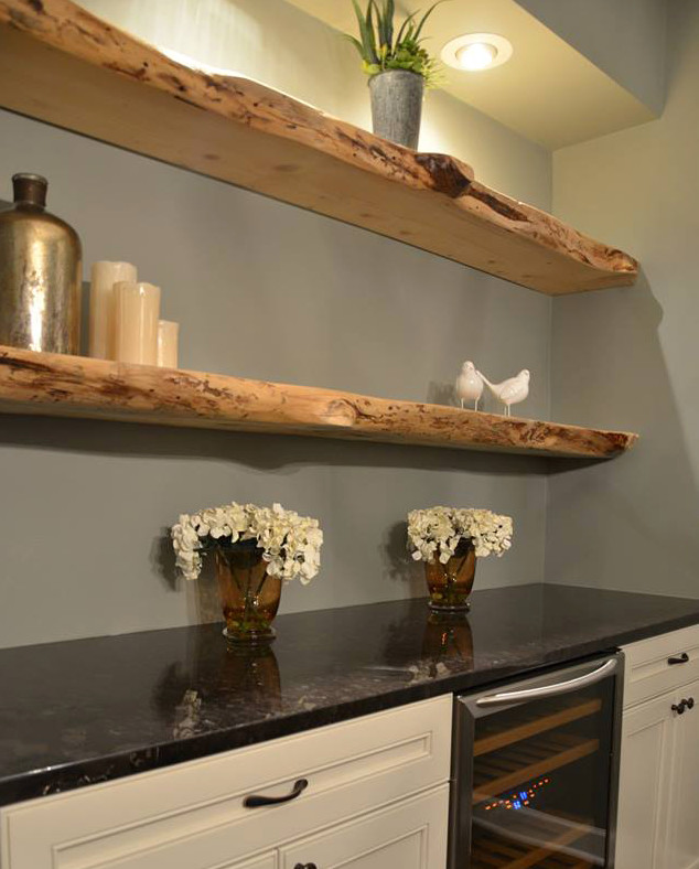 Inspiration for a mid-sized rustic dark wood floor and brown floor dining room remodel in Chicago with gray walls and no fireplace
