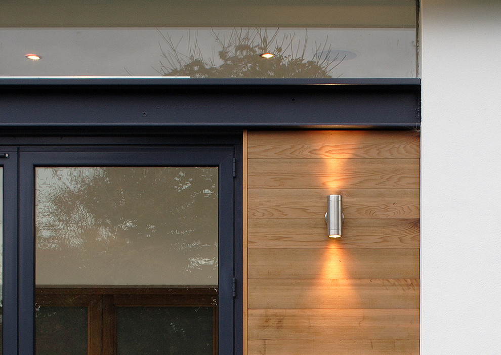 Design ideas for a contemporary exterior in Surrey.