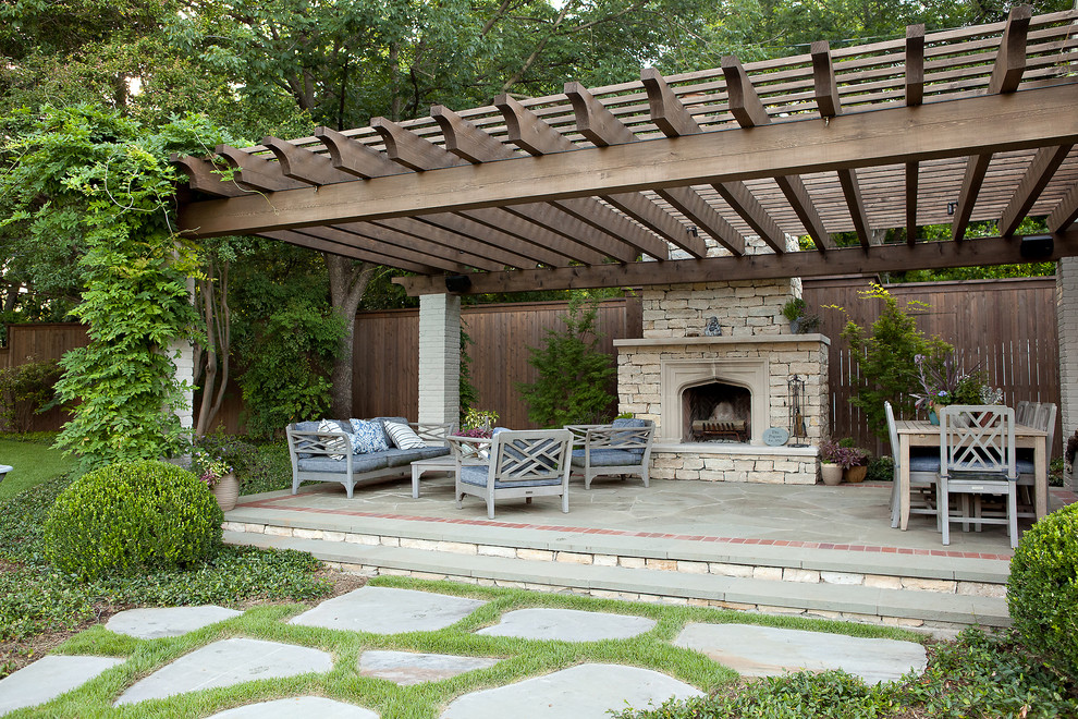 Patio - traditional patio idea in Dallas with a fire pit and a pergola
