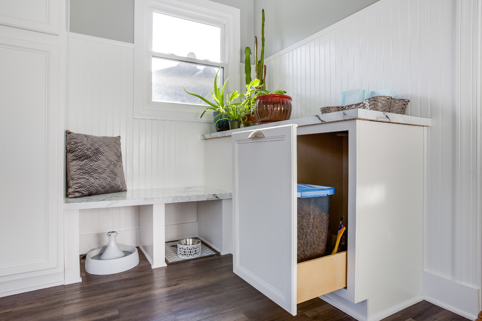 Design ideas for a small traditional mudroom in Birmingham with grey walls and laminate floors.