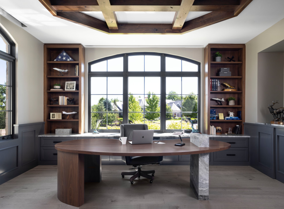 Example of a trendy home office design in Denver