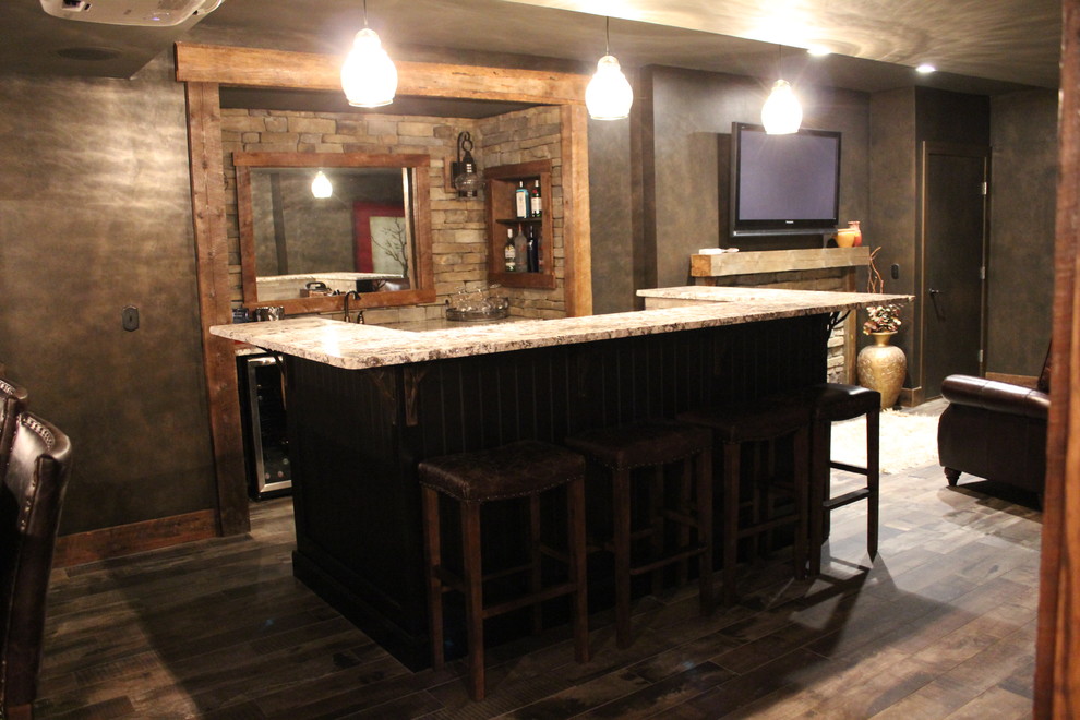 Design ideas for a mid-sized arts and crafts single-wall seated home bar in Boston with an undermount sink, granite benchtops, brown splashback, stone tile splashback, porcelain floors, brown floor and beige benchtop.