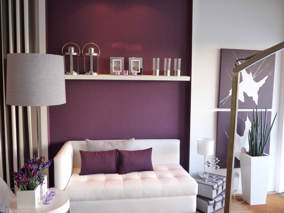 Photo of a contemporary living room with purple walls.