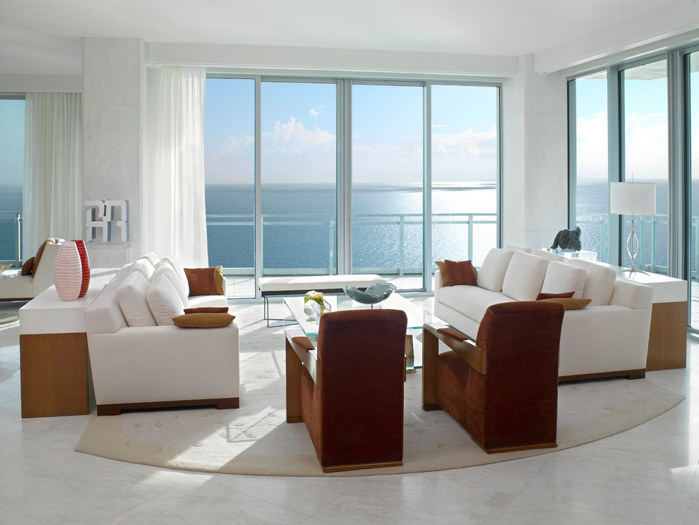 Photo of a large contemporary formal open concept living room in Miami with white walls, marble floors, no fireplace, no tv and white floor.