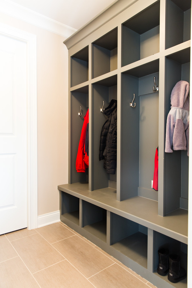 Small transitional porcelain tile and beige floor mudroom photo in Chicago with beige walls