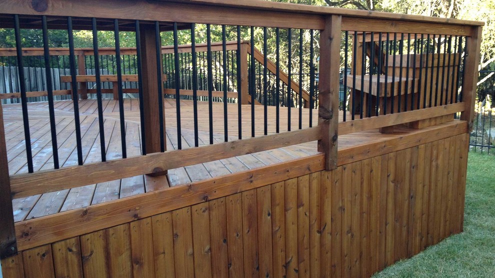 Deck - mid-sized transitional backyard deck idea in Austin with no cover
