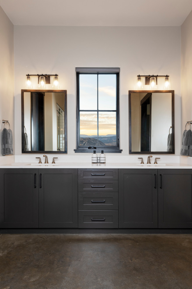 Design ideas for a large country master bathroom in Denver with recessed-panel cabinets, grey cabinets, concrete floors, an undermount sink, quartzite benchtops, grey floor and white benchtops.