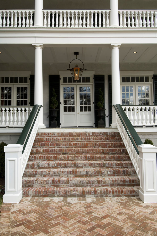 Photo of a traditional front door in Nashville with a double front door and a glass front door.