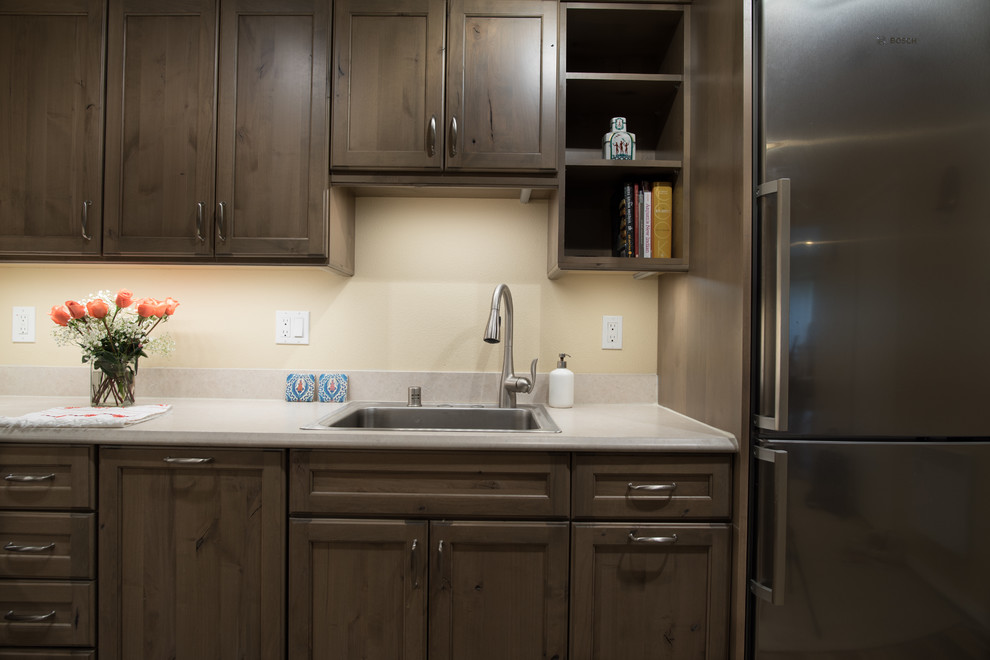 Inspiration for a transitional kitchen remodel in Seattle with yellow walls