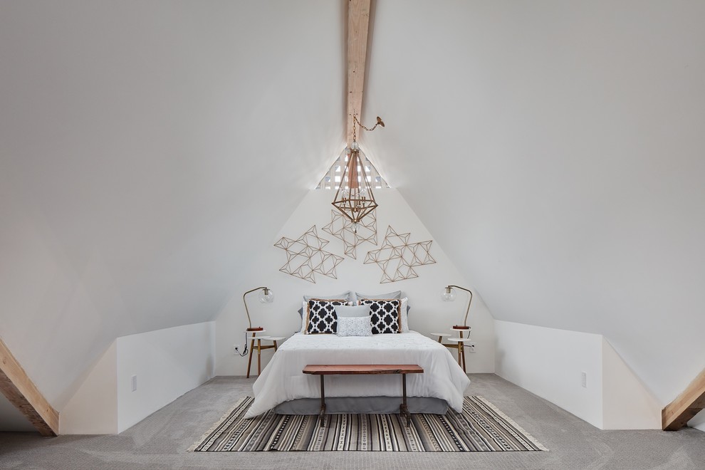 Photo of an eclectic master bedroom in Phoenix with white walls, carpet, no fireplace and grey floor.