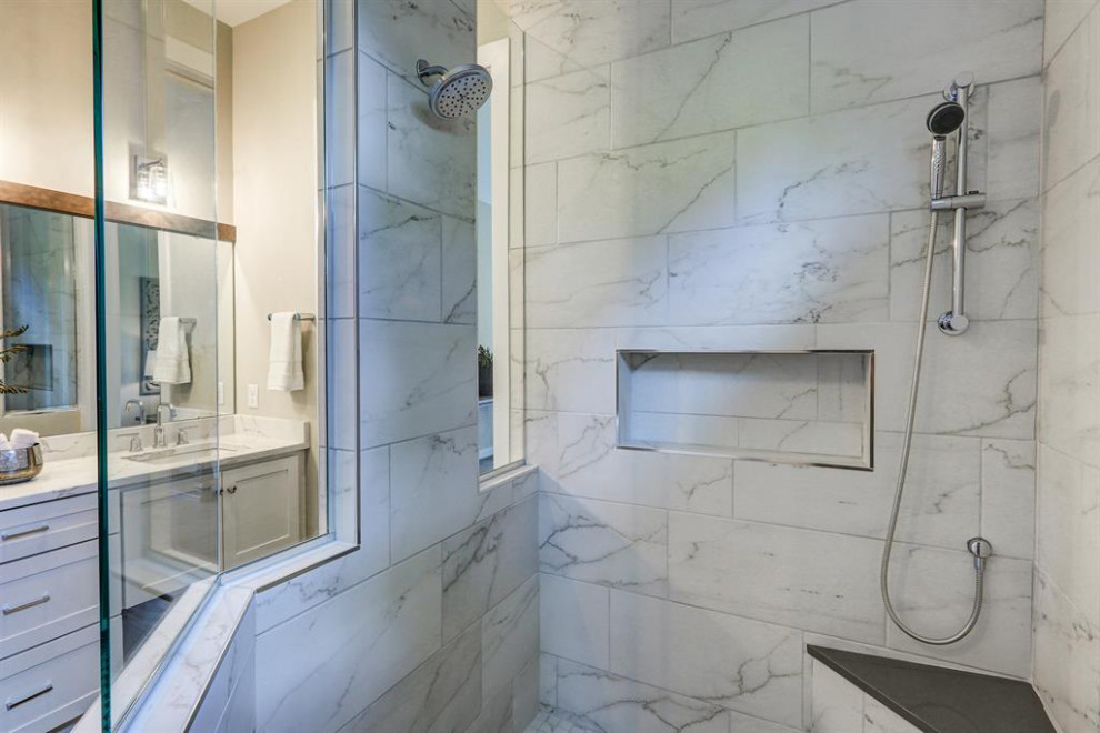 Design ideas for an expansive transitional master bathroom in Cincinnati with raised-panel cabinets, white cabinets, ceramic floors, an open shower, white benchtops, a shower seat, a double vanity and a built-in vanity.