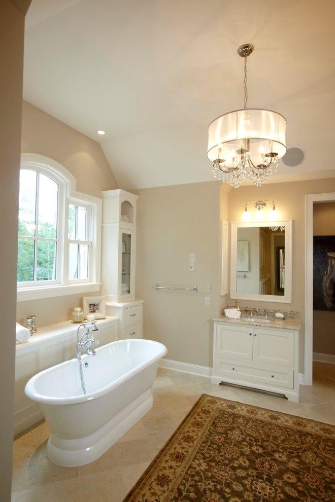 Inspiration for a traditional bathroom in Miami with a freestanding tub.