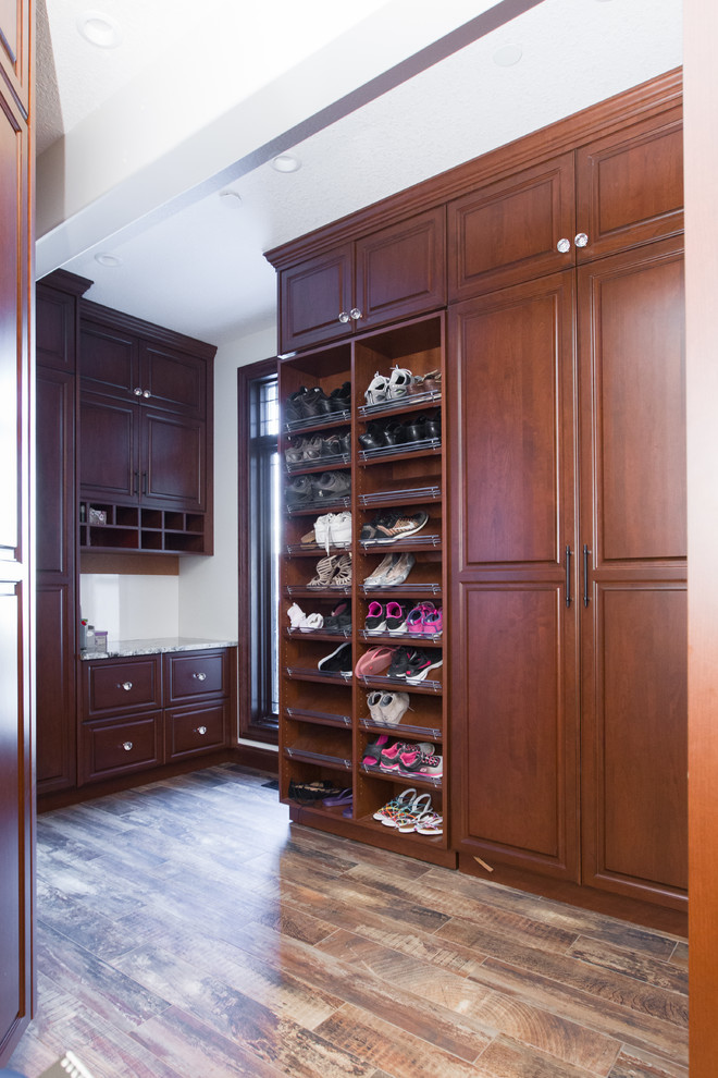 Example of a transitional closet design in Edmonton