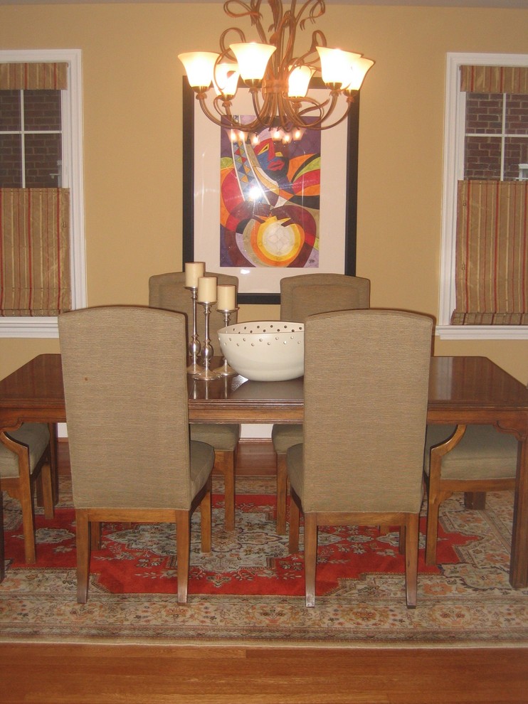 Kitchen/dining room combo - mid-sized transitional medium tone wood floor kitchen/dining room combo idea in DC Metro with beige walls