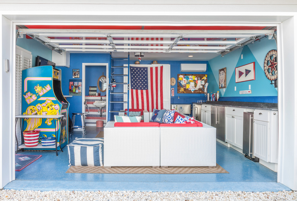 Design ideas for a mid-sized beach style two-car garage in New York.