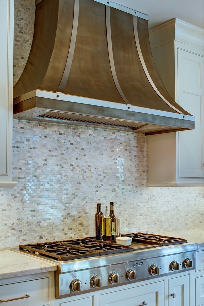 Example of a transitional kitchen design in New York
