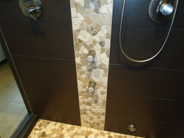 Inspiration for a modern bathroom in Indianapolis with an alcove shower, multi-coloured tile and stone tile.