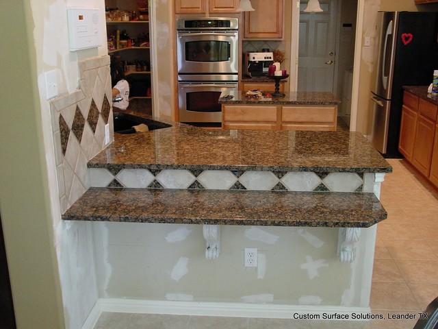 Kitchen - Backsplash Extension Add-on Granite Counters traditional-kitchen